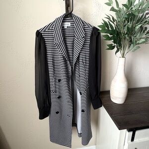 Stylish Black and white blazer.